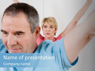 A Man And A Woman Are Looking At The Camera PowerPoint Template