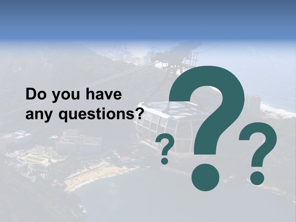 A Cable Car Going Up A Mountain With A City In The Background PowerPoint Template