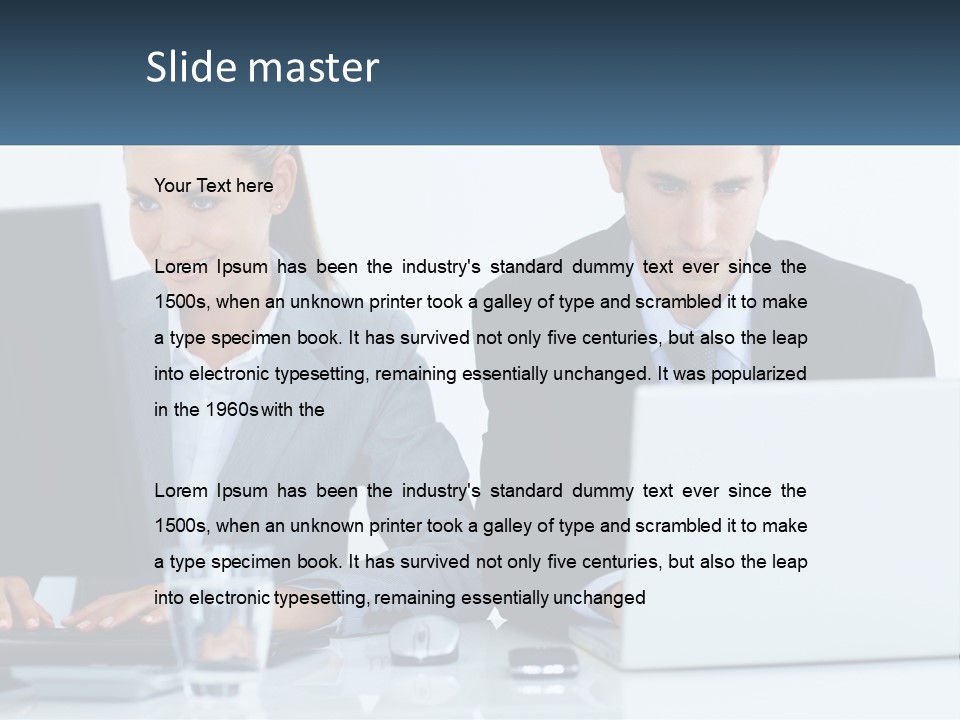 A Man And A Woman Sitting At A Desk In Front Of A Computer PowerPoint Template