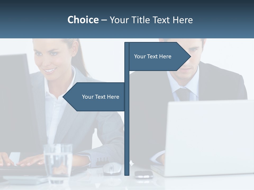 A Man And A Woman Sitting At A Desk In Front Of A Computer PowerPoint Template