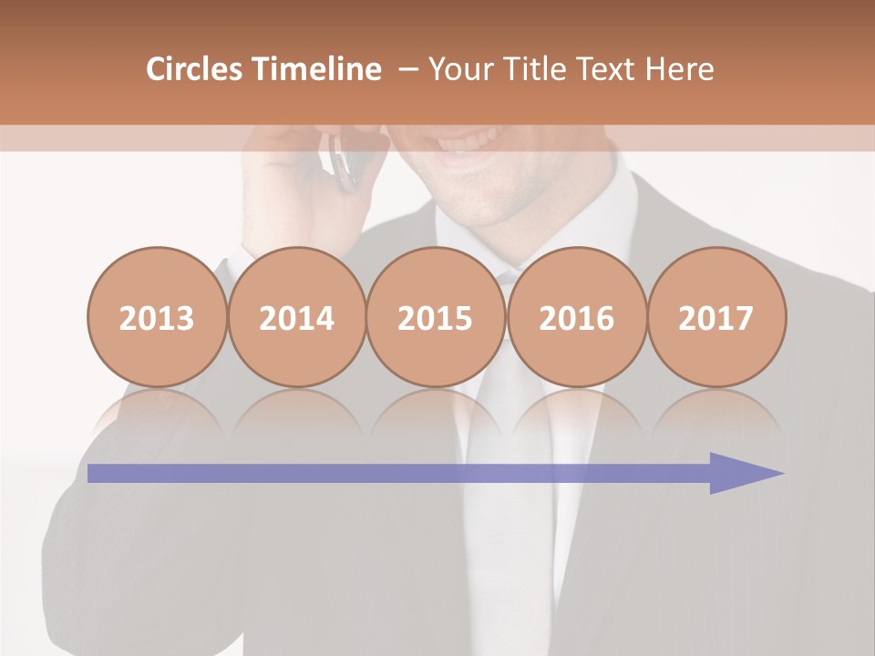 A Man In A Suit Talking On A Cell Phone PowerPoint Template