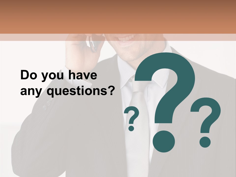 A Man In A Suit Talking On A Cell Phone PowerPoint Template