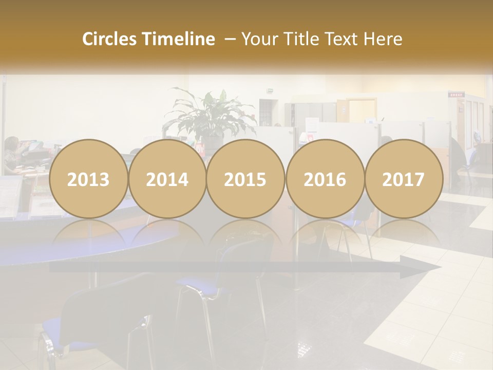 A Group Of People Sitting At Desks In An Office PowerPoint Template