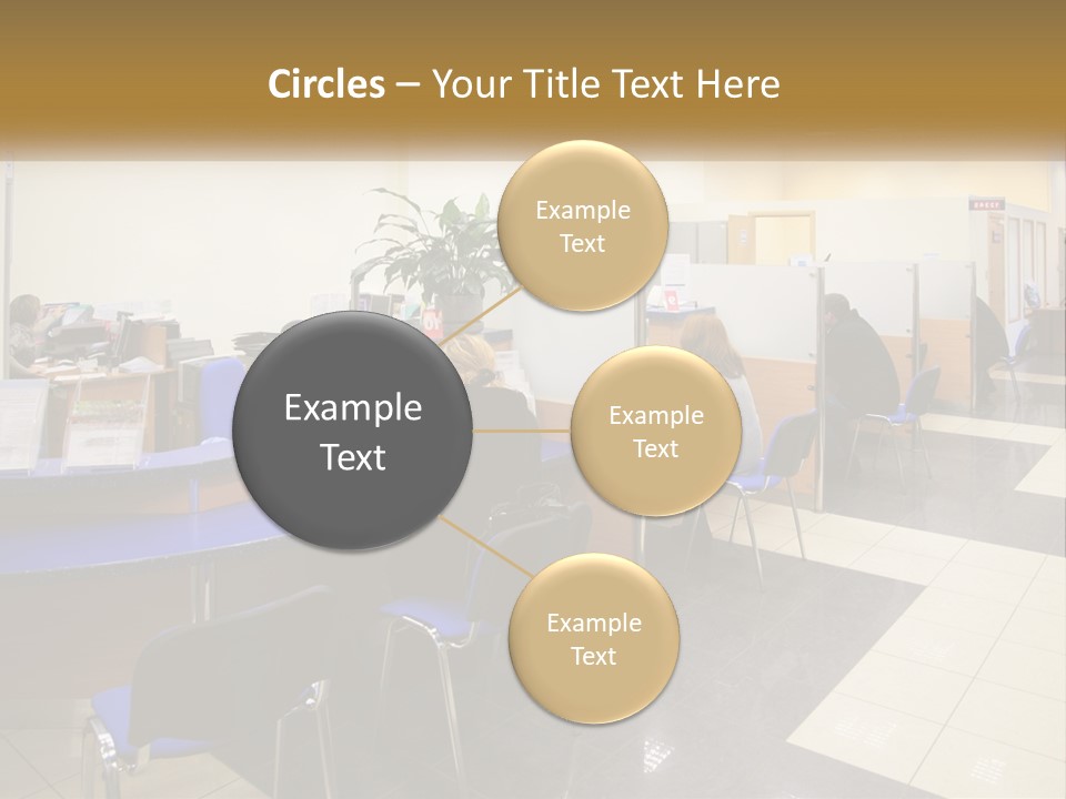 A Group Of People Sitting At Desks In An Office PowerPoint Template