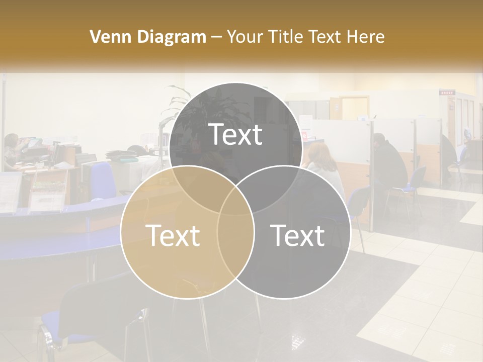 A Group Of People Sitting At Desks In An Office PowerPoint Template