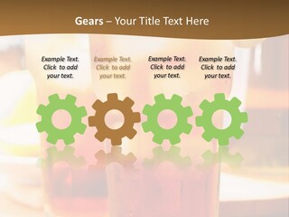 A Table Topped With Glasses Filled With Drinks PowerPoint Template