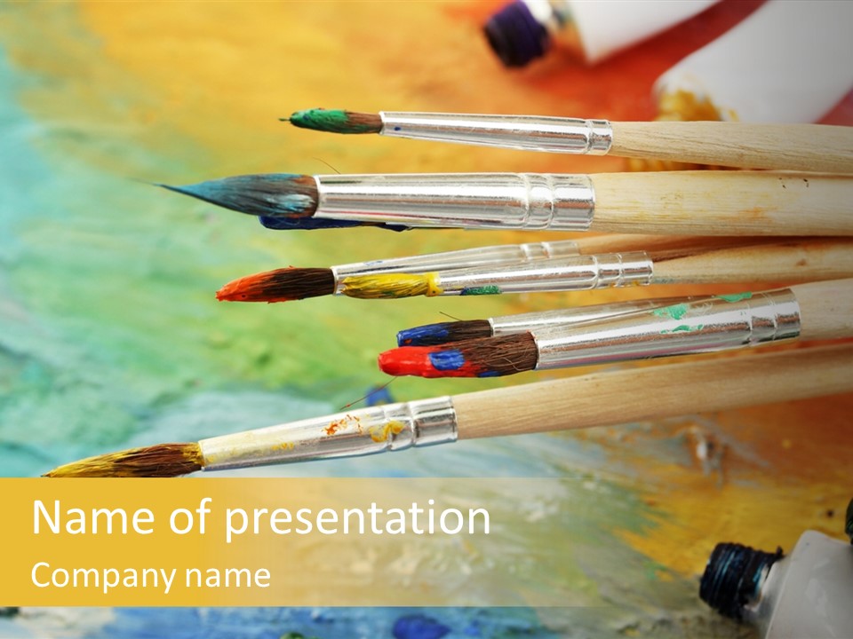 A Group Of Paintbrushes Sitting On Top Of A Table PowerPoint Template