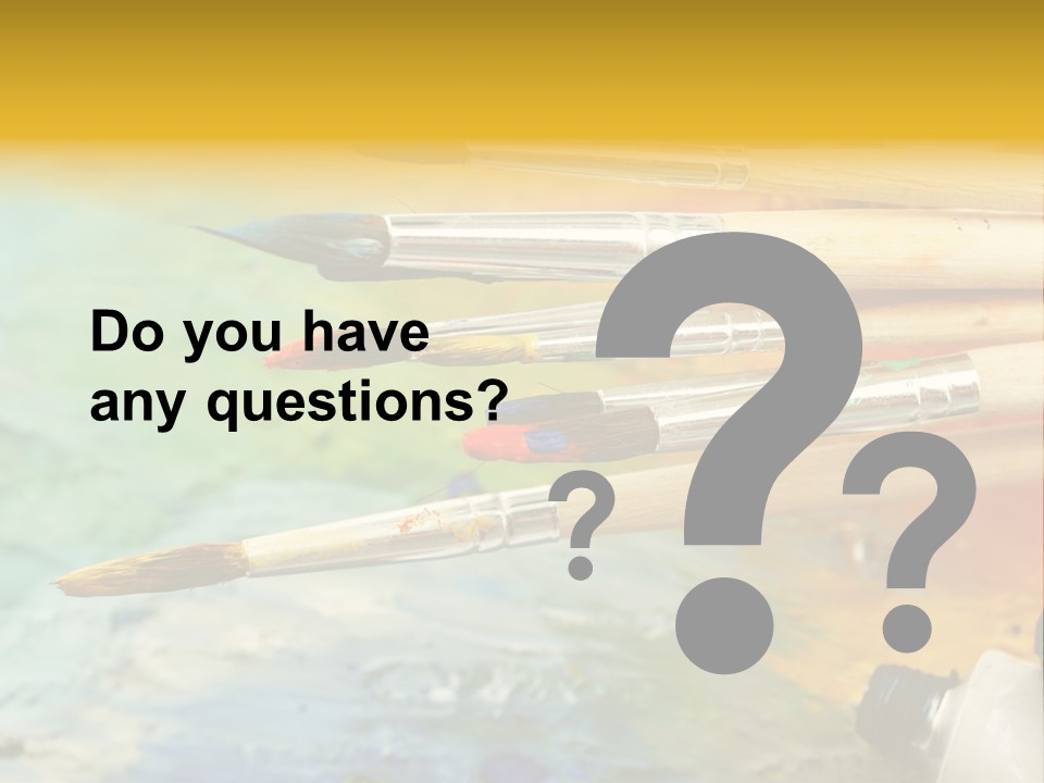 A Group Of Paintbrushes Sitting On Top Of A Table PowerPoint Template