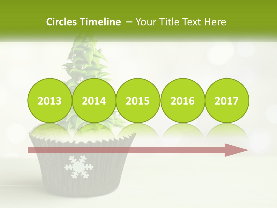 A Cupcake With A Christmas Tree On Top Of It PowerPoint Template