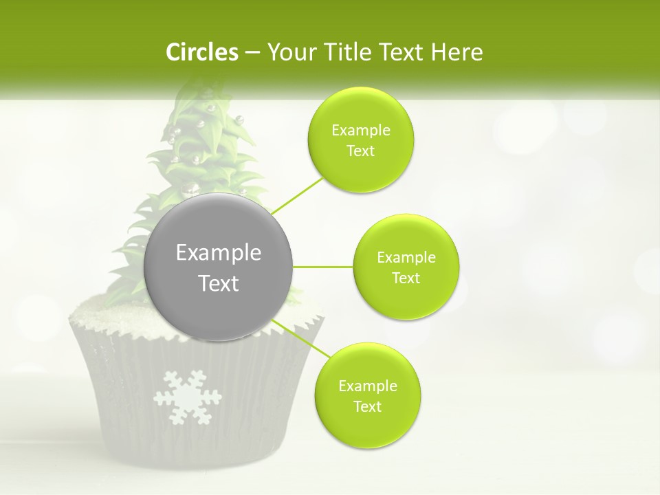 A Cupcake With A Christmas Tree On Top Of It PowerPoint Template