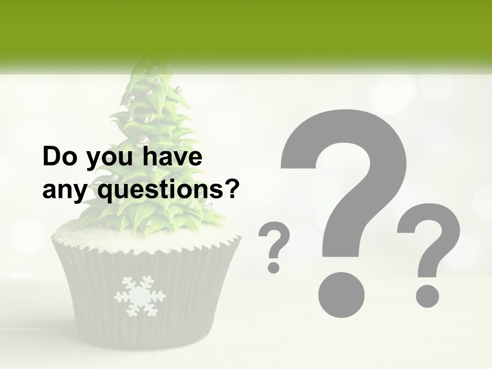 A Cupcake With A Christmas Tree On Top Of It PowerPoint Template