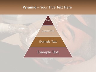 A Man Laying Down With A Breathing Mask On PowerPoint Template