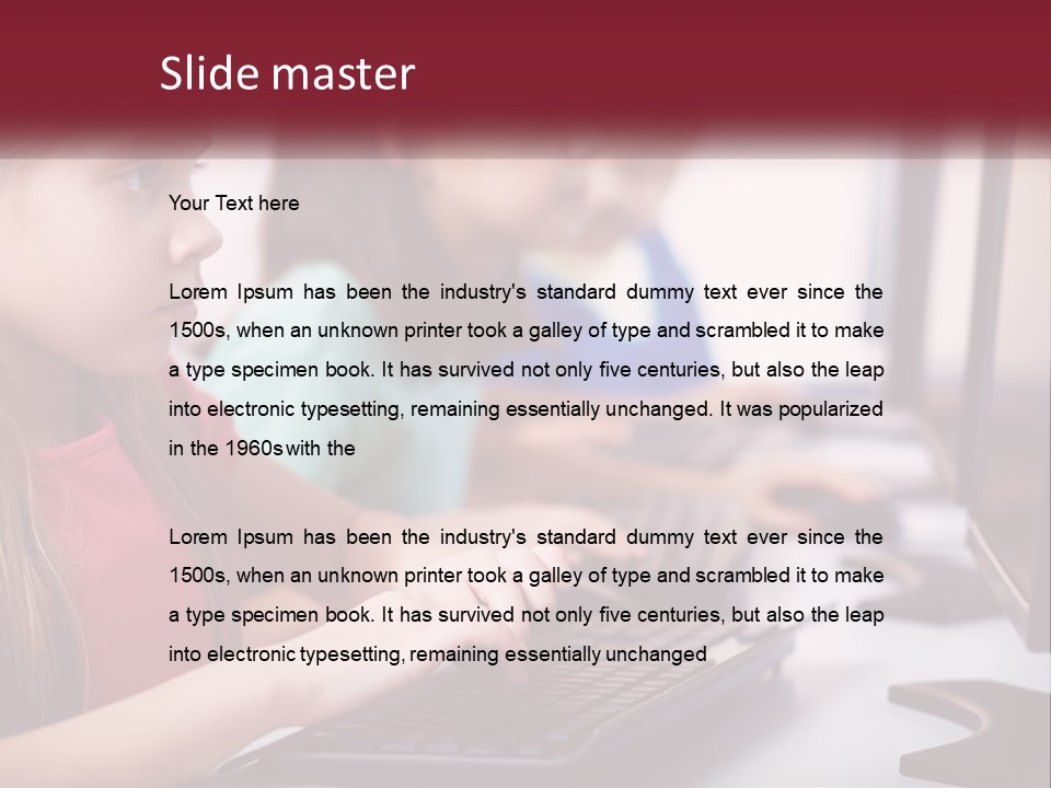 A Group Of Children Sitting At A Computer PowerPoint Template