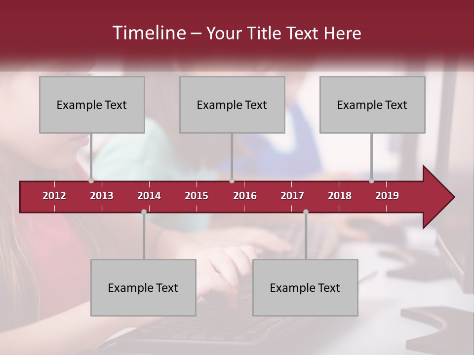 A Group Of Children Sitting At A Computer PowerPoint Template