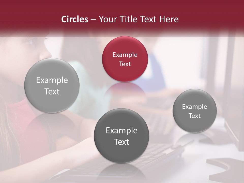 A Group Of Children Sitting At A Computer PowerPoint Template