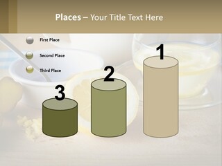 A Table Topped With A Bowl Of Lemons And A Cup Of Tea PowerPoint Template