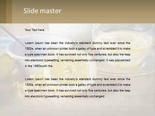 A Table Topped With A Bowl Of Lemons And A Cup Of Tea PowerPoint Template