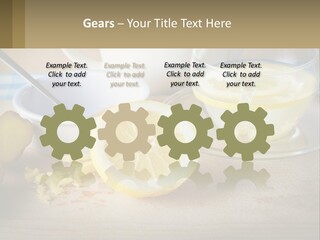 A Table Topped With A Bowl Of Lemons And A Cup Of Tea PowerPoint Template