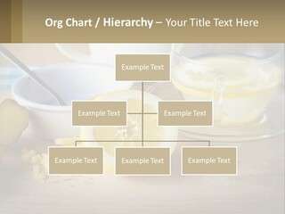 A Table Topped With A Bowl Of Lemons And A Cup Of Tea PowerPoint Template