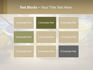 A Table Topped With A Bowl Of Lemons And A Cup Of Tea PowerPoint Template