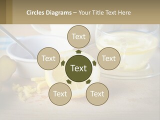 A Table Topped With A Bowl Of Lemons And A Cup Of Tea PowerPoint Template