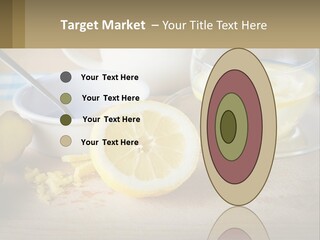 A Table Topped With A Bowl Of Lemons And A Cup Of Tea PowerPoint Template