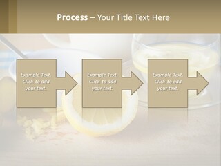 A Table Topped With A Bowl Of Lemons And A Cup Of Tea PowerPoint Template