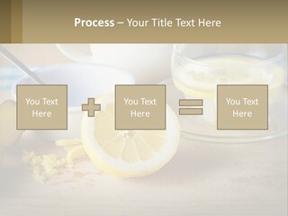 A Table Topped With A Bowl Of Lemons And A Cup Of Tea PowerPoint Template