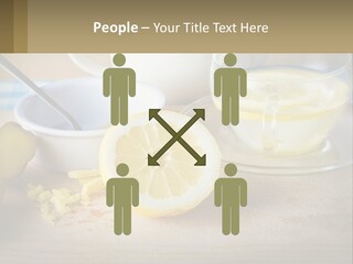 A Table Topped With A Bowl Of Lemons And A Cup Of Tea PowerPoint Template
