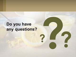 A Table Topped With A Bowl Of Lemons And A Cup Of Tea PowerPoint Template