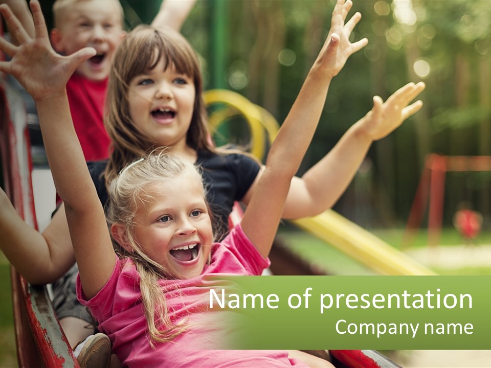 A Group Of Children Riding On Top Of A Slide PowerPoint Template