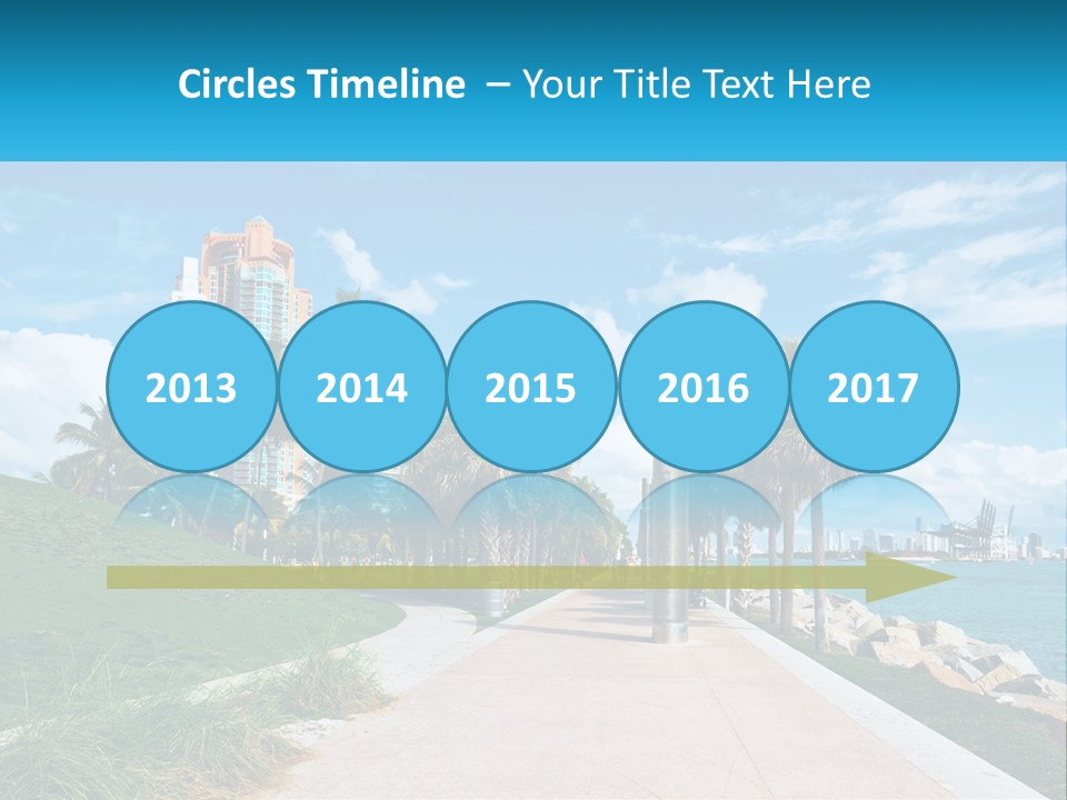 A Walkway With Palm Trees And A Body Of Water In The Background PowerPoint Template