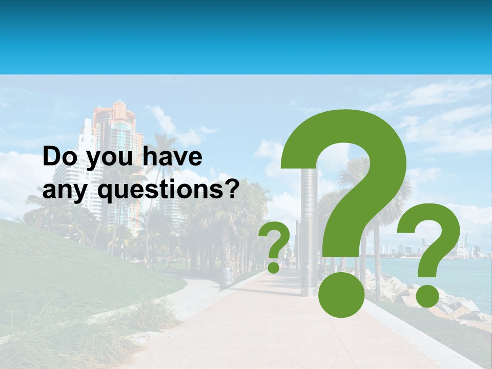 A Walkway With Palm Trees And A Body Of Water In The Background PowerPoint Template