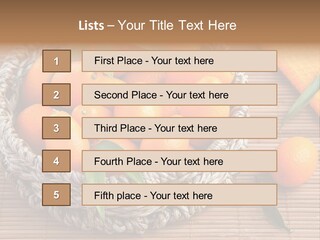 A Basket Filled With Oranges On Top Of A Bamboo Mat PowerPoint Template