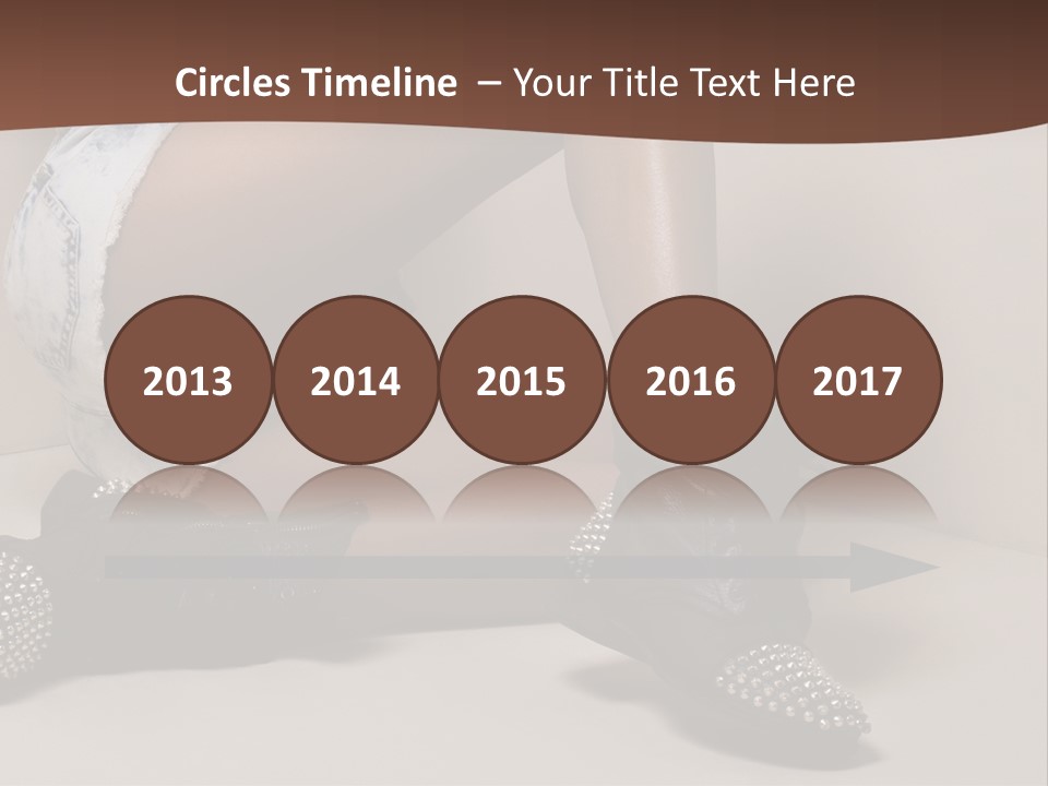 A Woman Sitting On A Couch With Her Legs Crossed PowerPoint Template