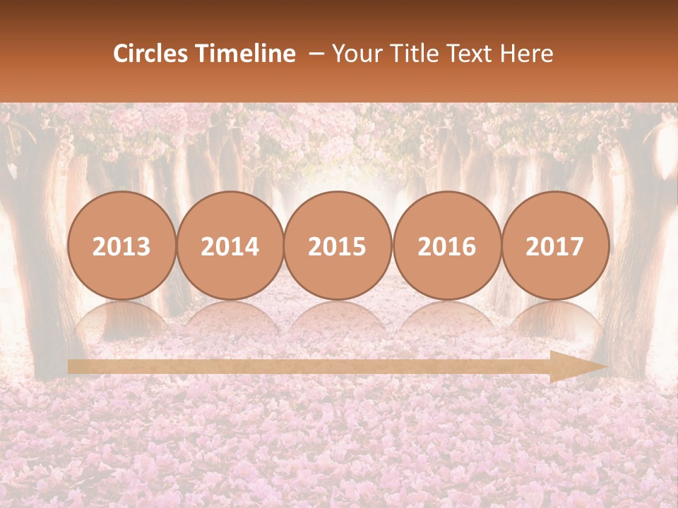 A Beautiful Pink Flowered Path With Trees In The Background PowerPoint Template