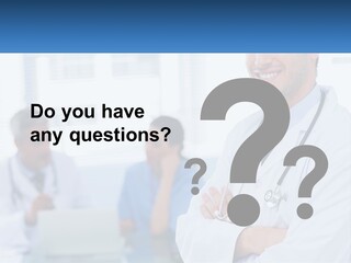 A Doctor Standing In Front Of A Laptop Computer PowerPoint Template