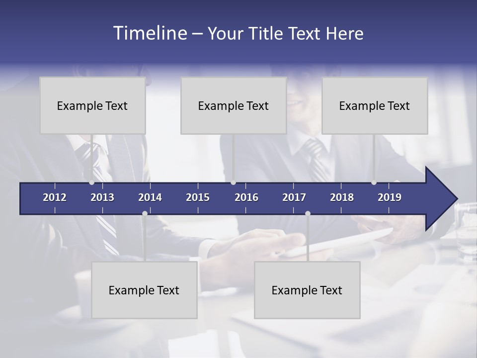 Two Men In Business Suits Sitting At A Table PowerPoint Template