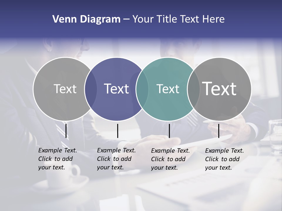 Two Men In Business Suits Sitting At A Table PowerPoint Template