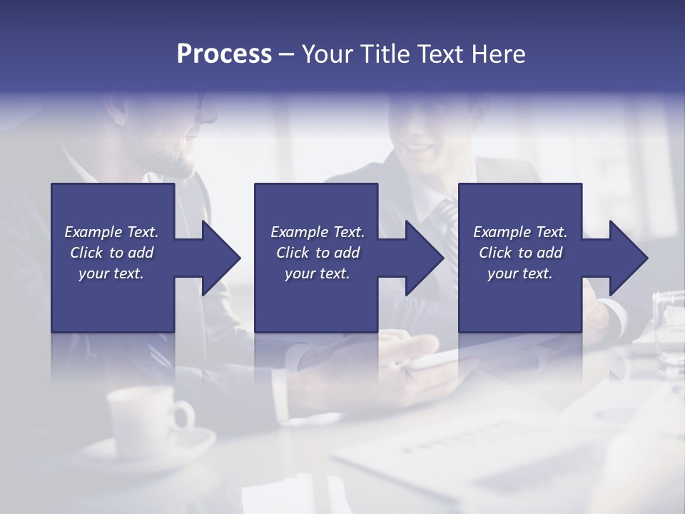 Two Men In Business Suits Sitting At A Table PowerPoint Template
