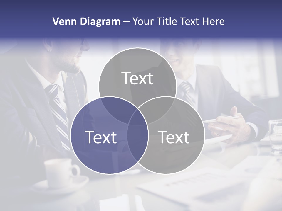 Two Men In Business Suits Sitting At A Table PowerPoint Template