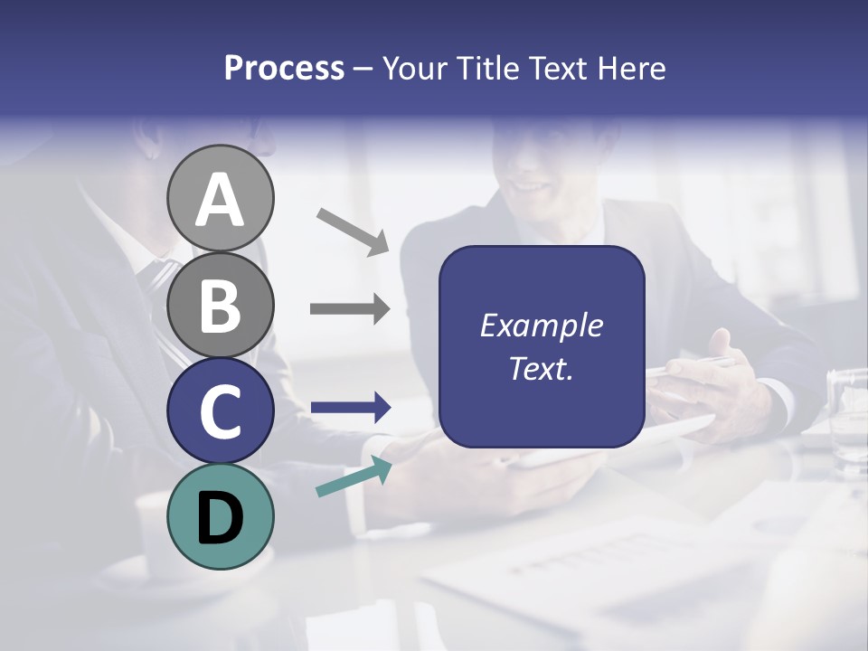 Two Men In Business Suits Sitting At A Table PowerPoint Template