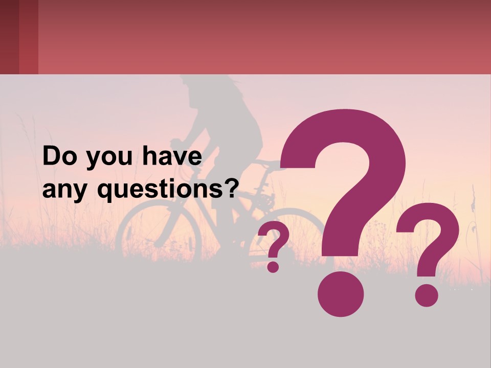 A Person Riding A Bike At Sunset Powerpoint Template PowerPoint Template