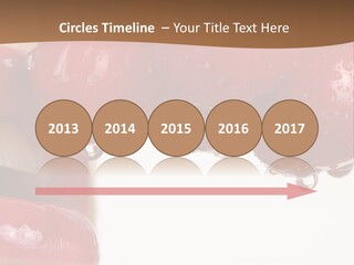 A Woman Biting Into Some Cherries With Her Mouth Open PowerPoint Template