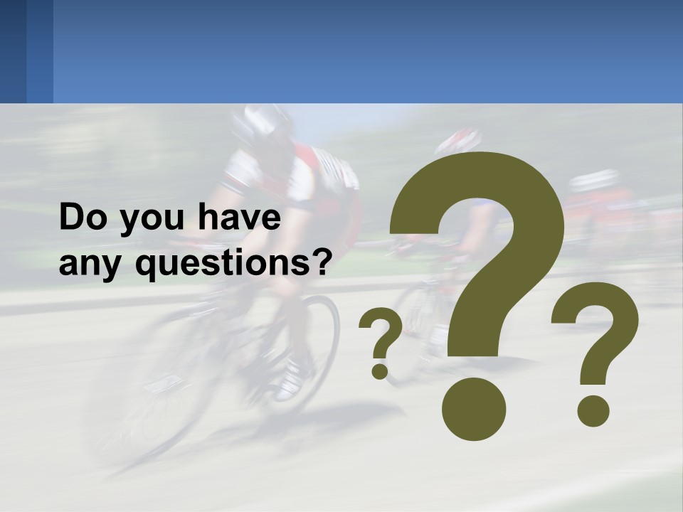 A Group Of People Riding Bikes Down A Street PowerPoint Template