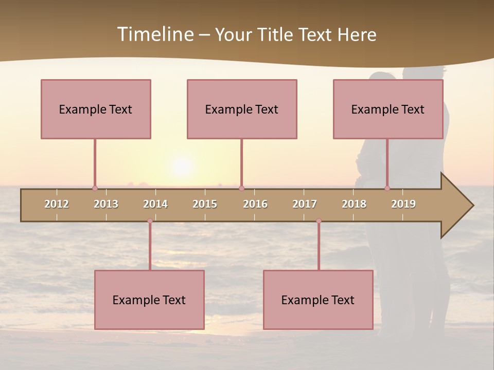Two People Standing On A Beach At Sunset PowerPoint Template