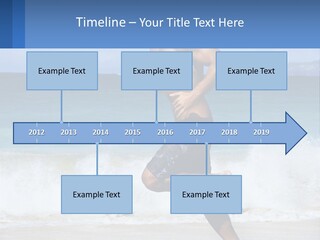 A Man Running On The Beach With The Ocean In The Background PowerPoint Template