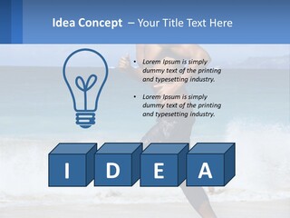 A Man Running On The Beach With The Ocean In The Background PowerPoint Template
