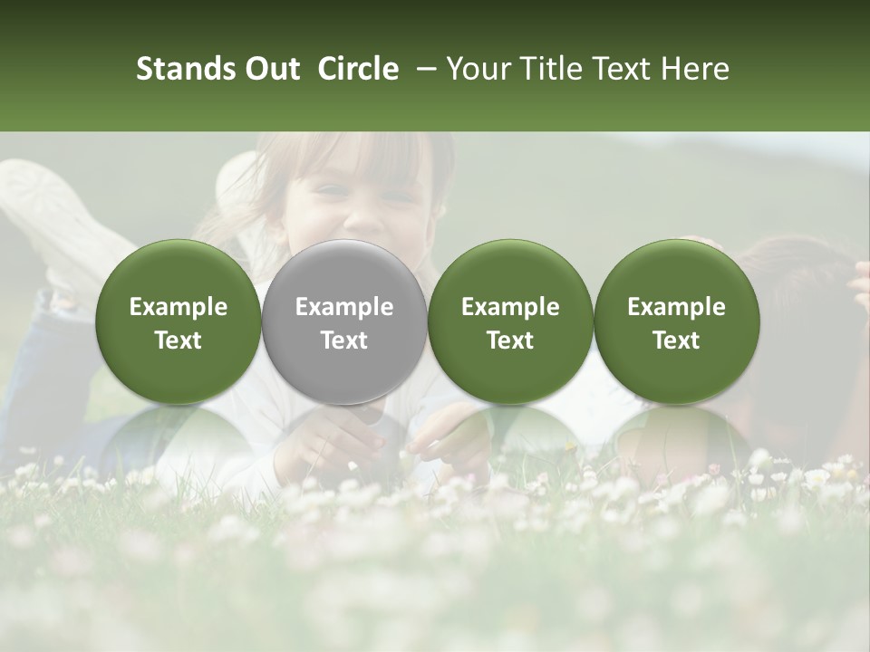 Two Young Girls Laying In The Grass With A Name Plate PowerPoint Template