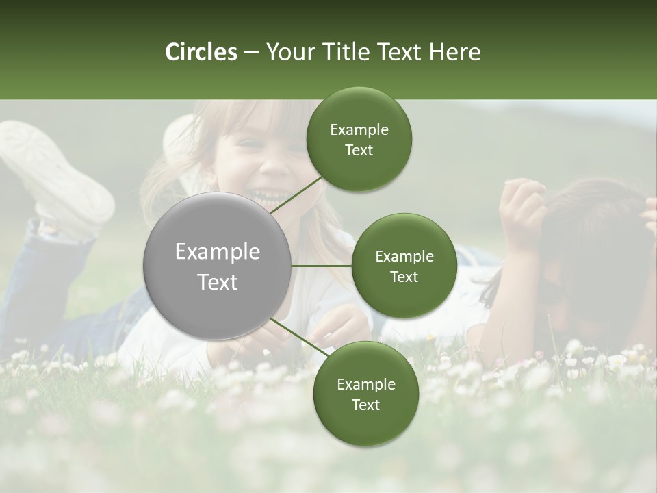 Two Young Girls Laying In The Grass With A Name Plate PowerPoint Template